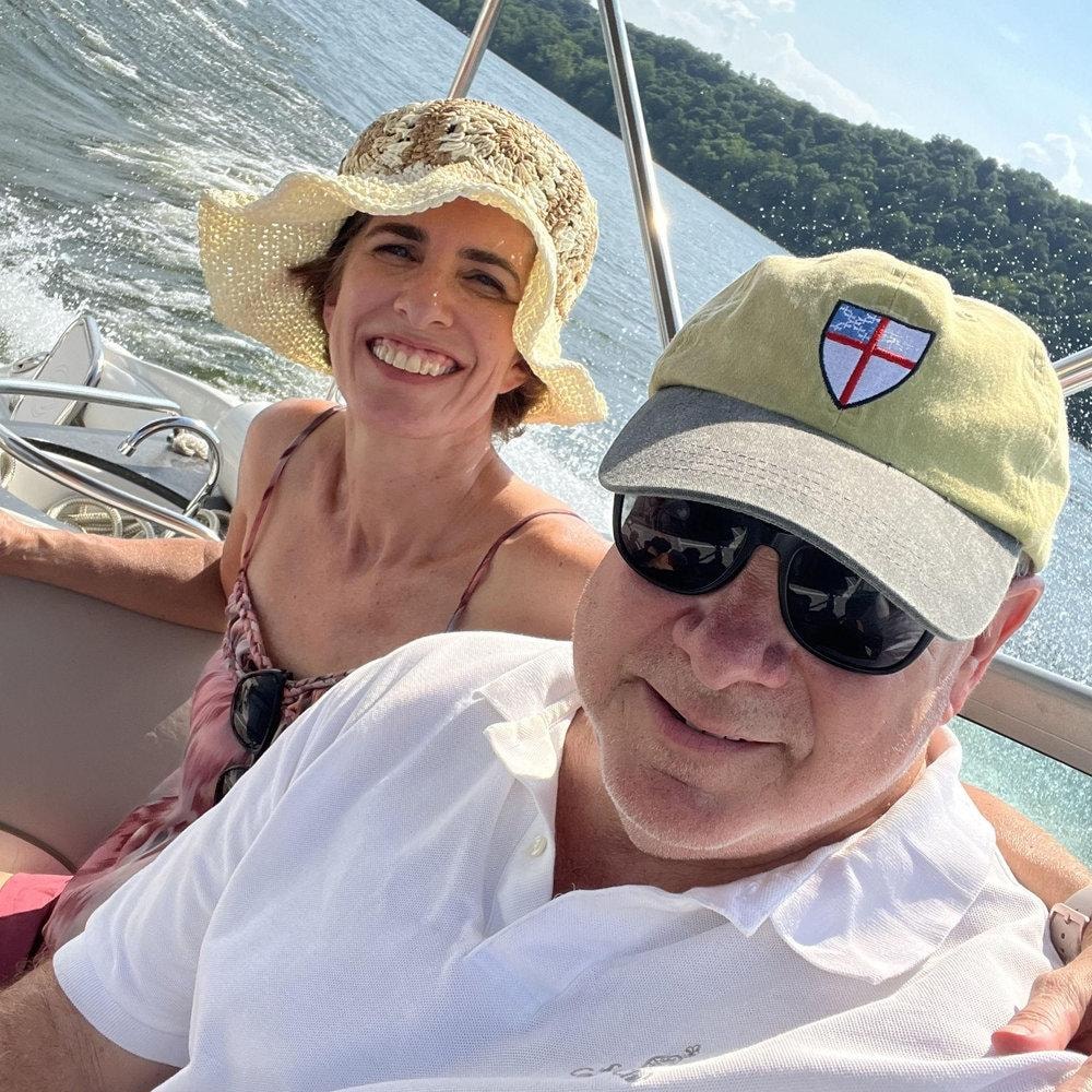 Veronique and Dan on a boat on the water